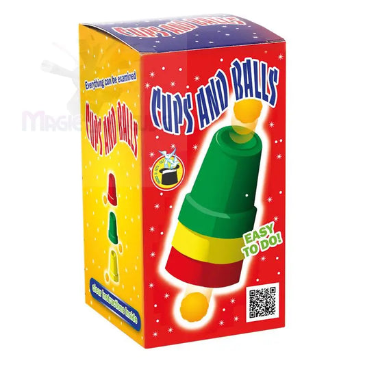 Ein Zaubertrick-Set ’Cups and Balls’ in einer bunten Verkaufsbox.