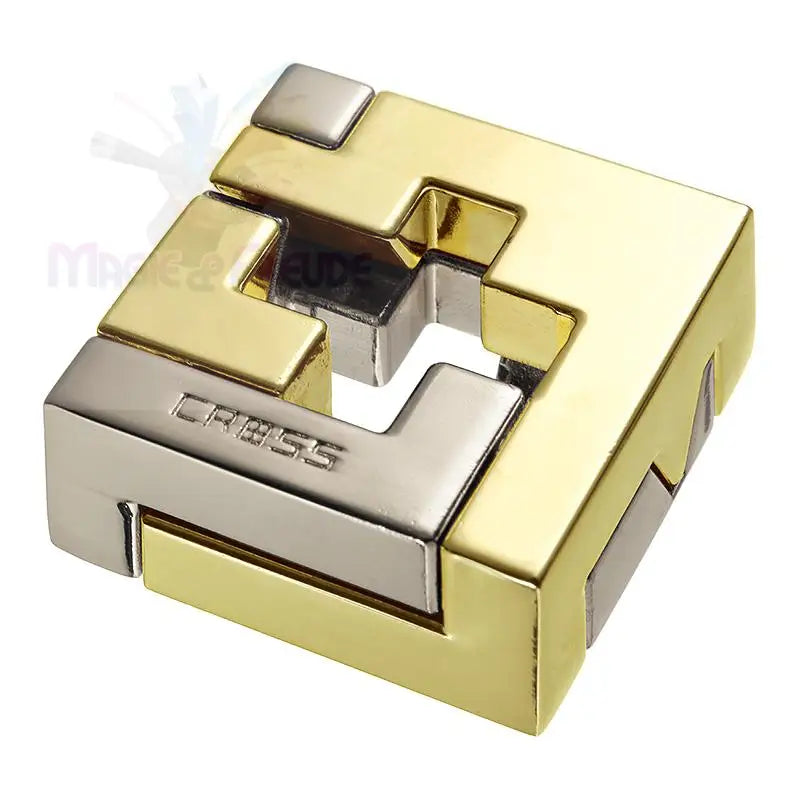 Ein zweifarbiges Metallpuzzle in Gold und Silber.