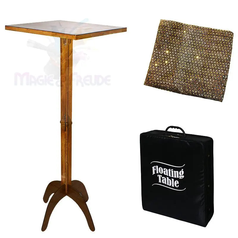 Ein zusammenklappbarer Holztisch mit einer schwarzen Tragetasche und einem glitzernden Goldtuch.