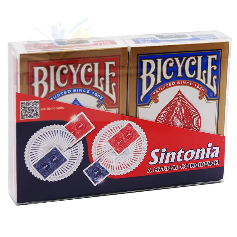 Ein Zweierpack Spielkarten der Marke Bicycle, eine rote und eine blaue, mit einem ’Sintonia’-Zaubertrickset.