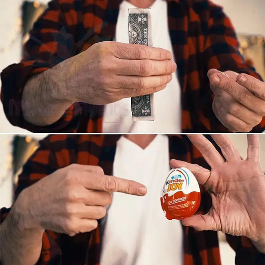 Magier führt Zaubertrick mit Geldschein und Kinder Joy Überraschungsei vor