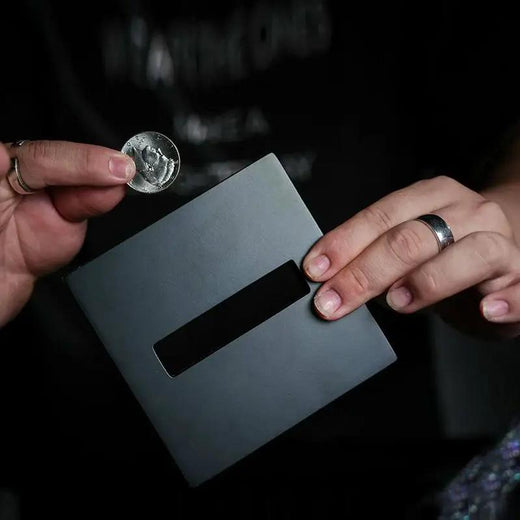 Coin Thru Anything by Nathan Kranzo & TCC Magic by Difatta