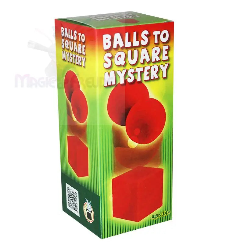 Eine grün-gelbe Schachtel mit dem Aufdruck ’Balls to Square Mystery’, auf der Abbildungen von roten Kugeln zu sehen sind, die sich in einen roten Würfel verwandeln, was auf einen Zaubertrick oder ein Rätsel hinweist.