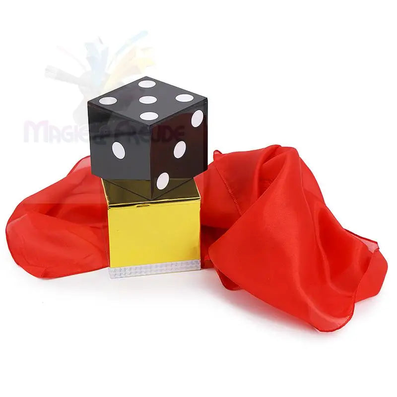 Schwarz-goldene Zauberwürfel mit roten Seidentüchern.