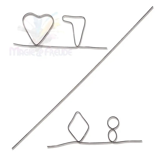Ein dünner Metalldraht, der in verschiedene Formen gebogen ist, darunter ein Herz, ein T, ein Diamant und ein Unendlichkeitssymbol.
