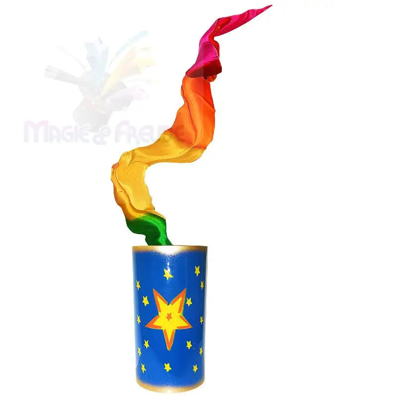 Ein blaues, zylindrisches Zaubertrick-Requisit mit einem gelben Sternmuster, aus dem ein mehrfarbiges Seidentuch herausragt.