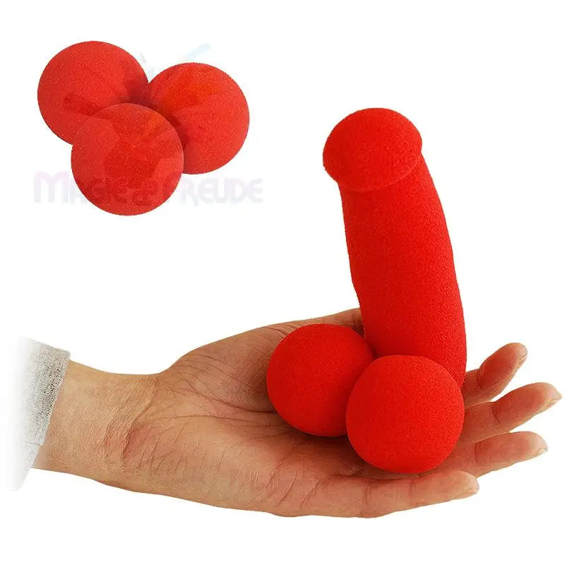 Roter Schaumstoff-Neuheitspenis mit zwei Kugeln.
