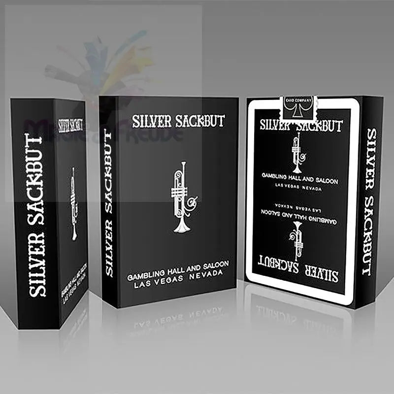 Set aus drei schwarzen Spielkartenboxen.