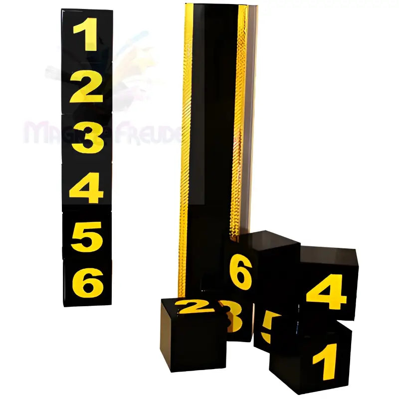Ein Satz schwarzer Blöcke mit gelben Zahlen für einen Zaubertrick.