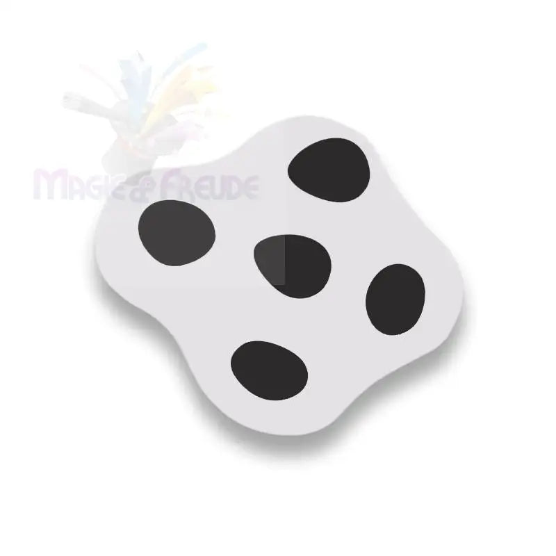 Ein flaches, unregelmäßig geformtes, hellgraues Objekt mit fünf dunkelgrauen oder schwarzen Flecken.