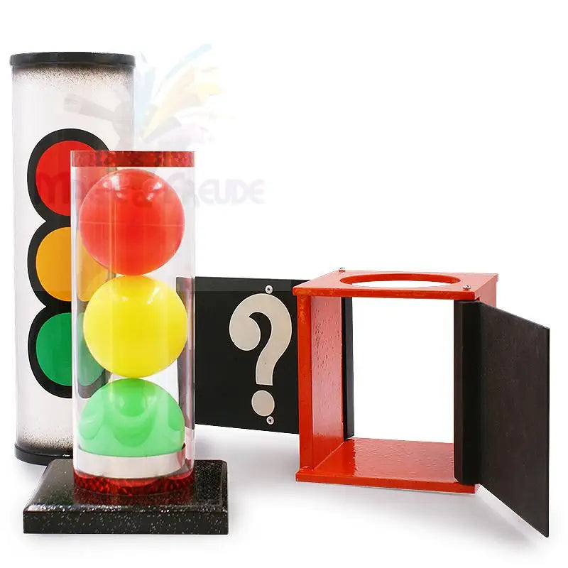Zaubertrick-Requisiten wie eine Ampelröhre, farbige Kugeln und eine geheimnisvolle Schachtel.