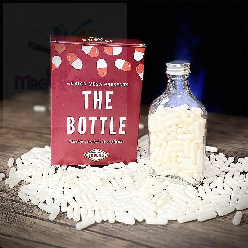 Ein roter Zauberkasten mit einer Glasflasche voller weißer Pillen.