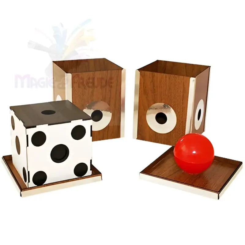 Zaubertrickset mit Würfeln und Schachteln.