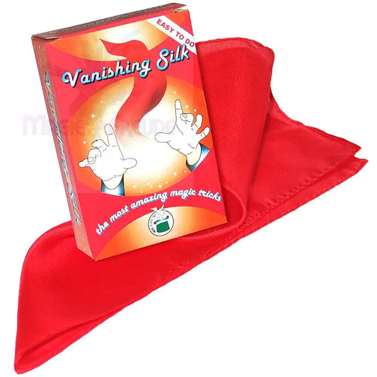 Ein rotes ’Vanishing Silk’-Zaubertrickset mit einem gefalteten roten Seidenschal.